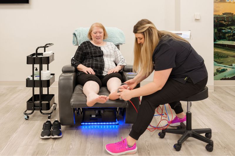 Woman Getting Neuropathy Therapy in Oklahoma City at Nerve Renewal Now Clinic