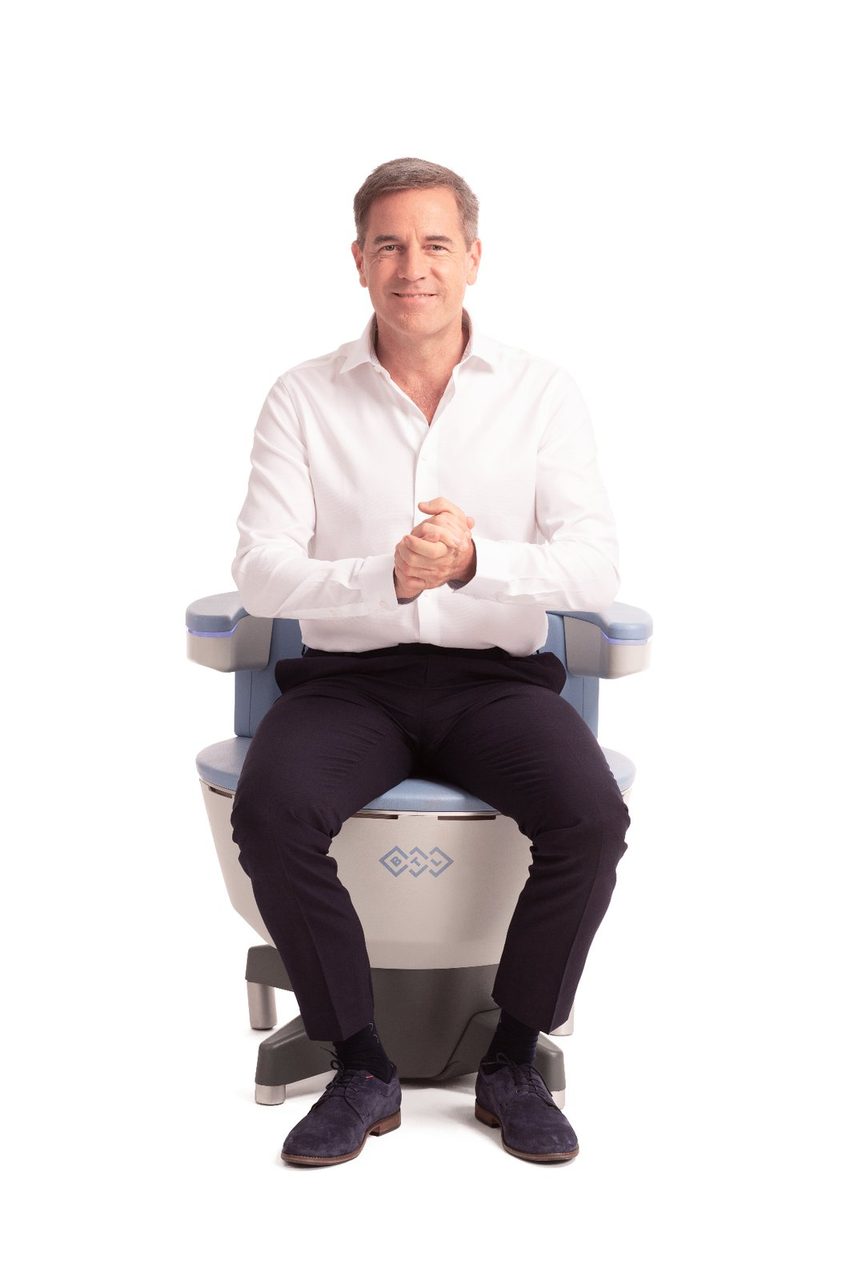 Man seated during an incontinence treatment session